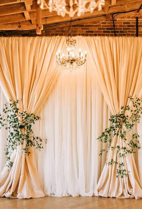 Wedding photo booth styled within the reception